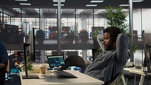 stressed-african-american-businessman-takes-break-from-his-office-tasks - INFINION Technologies